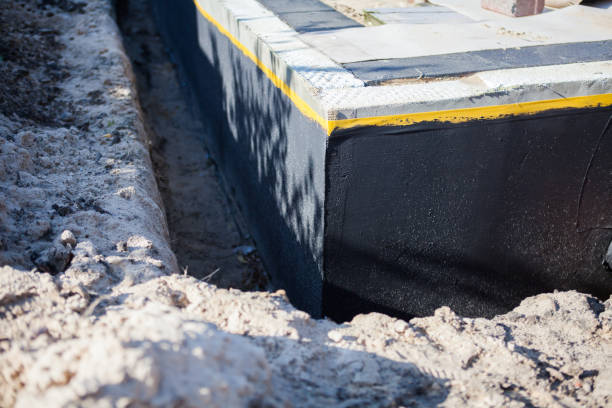 Professional Waterproofing technician working in Richland, WA